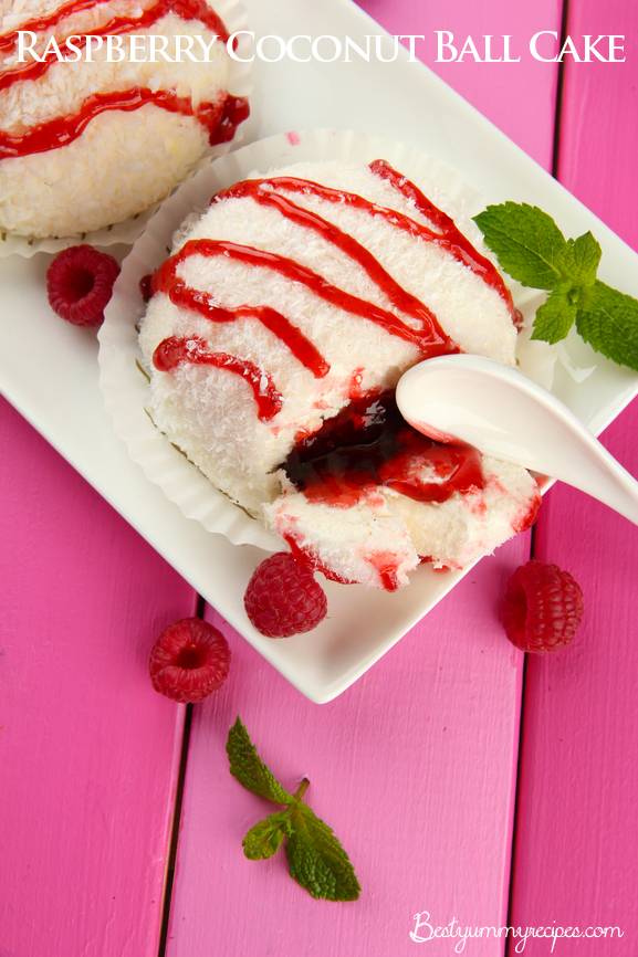 Delicious coconut cakes on plate on table close-up