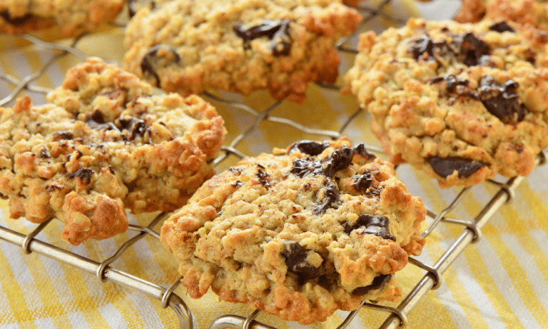 Delicious 4-ingredient protein cookies packed with 40g of protein, cooling on a wire rack.