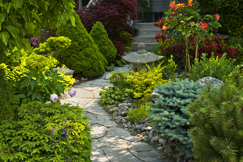 Natural flagstone path landscaping in home garden