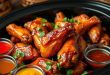 crockpot chicken wings 3 ways video Slow cooker chicken wings glazed with barbecue sauce and garnished with fresh herbs, served with dipping sauces.