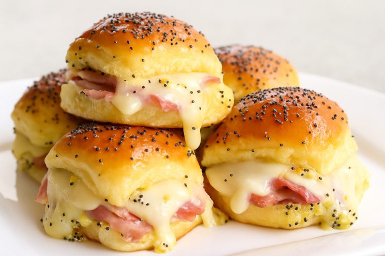Delicious Hot Ham and Cheese Sliders on Hawaiian Rolls with Poppy Seed